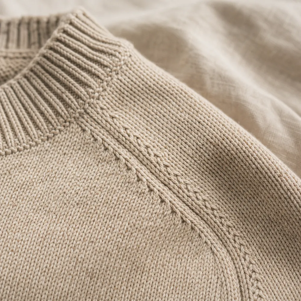 Full-fashion shoulder detail — Knitwear sourced by Almekora Global